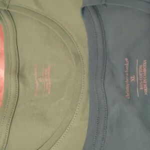 Two sleeveless tanks